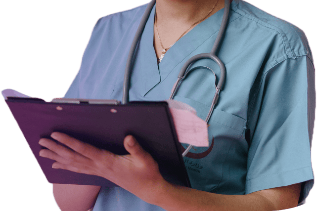 A primary care healthcare professional in a blue uniform with a stethoscope around their neck, holding a clipboard and making notes.